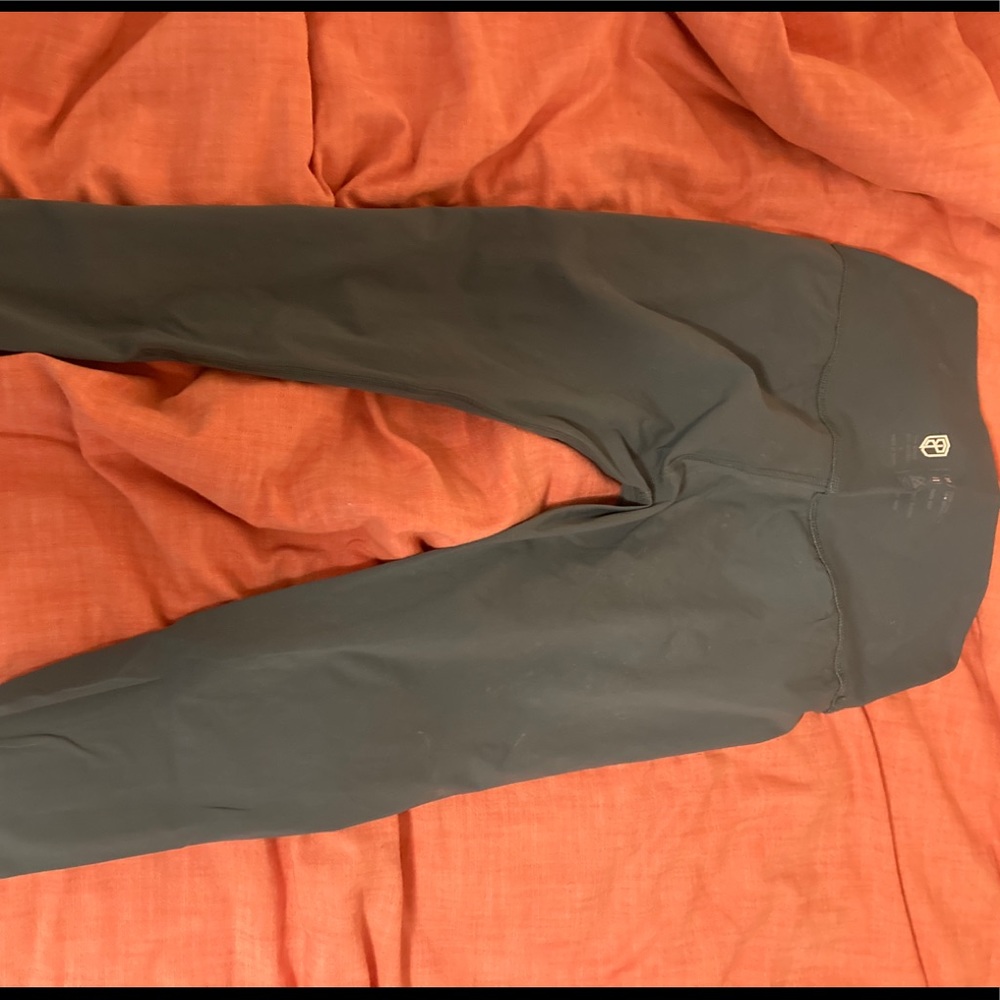 Born Primitive teal silky leggings